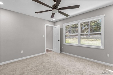 Completely renovated from top to bottom, this 4-bedroom, 3-bath on Terre Du Lac Golf and Country Club in Missouri - for sale on GolfHomes.com, golf home, golf lot