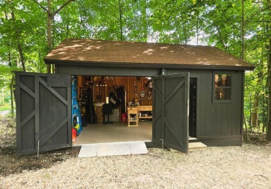 Welcome to your perfect cabin in the woods in Hide A-Way Hills! on Hide-A-Way Hills Golf Club in Ohio - for sale on GolfHomes.com, golf home, golf lot