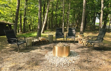 Welcome to your perfect cabin in the woods in Hide A-Way Hills! on Hide-A-Way Hills Golf Club in Ohio - for sale on GolfHomes.com, golf home, golf lot
