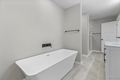 Completely renovated from top to bottom, this 4-bedroom, 3-bath on Terre Du Lac Golf and Country Club in Missouri - for sale on GolfHomes.com, golf home, golf lot