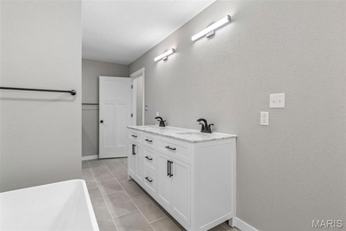 Completely renovated from top to bottom, this 4-bedroom, 3-bath on Terre Du Lac Golf and Country Club in Missouri - for sale on GolfHomes.com, golf home, golf lot