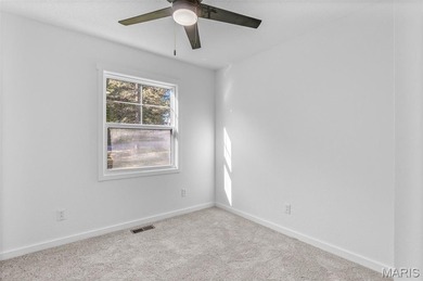 Completely renovated from top to bottom, this 4-bedroom, 3-bath on Terre Du Lac Golf and Country Club in Missouri - for sale on GolfHomes.com, golf home, golf lot