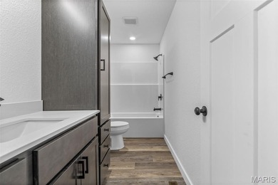 Completely renovated from top to bottom, this 4-bedroom, 3-bath on Terre Du Lac Golf and Country Club in Missouri - for sale on GolfHomes.com, golf home, golf lot