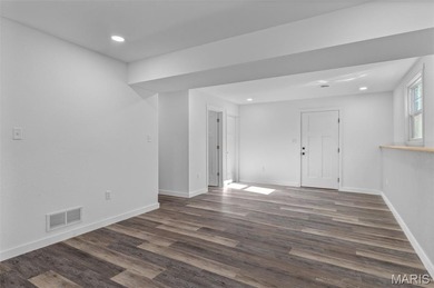 Completely renovated from top to bottom, this 4-bedroom, 3-bath on Terre Du Lac Golf and Country Club in Missouri - for sale on GolfHomes.com, golf home, golf lot