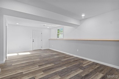 Completely renovated from top to bottom, this 4-bedroom, 3-bath on Terre Du Lac Golf and Country Club in Missouri - for sale on GolfHomes.com, golf home, golf lot