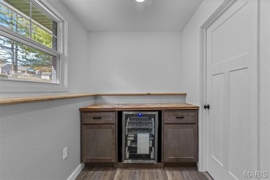 Completely renovated from top to bottom, this 4-bedroom, 3-bath on Terre Du Lac Golf and Country Club in Missouri - for sale on GolfHomes.com, golf home, golf lot