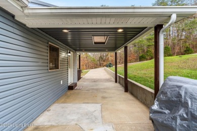 Escape to your dream lake-home retreat! This beautifully on Shady Hollow Golf Course in Kentucky - for sale on GolfHomes.com, golf home, golf lot