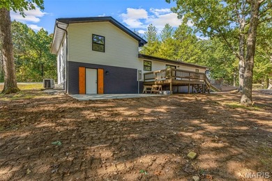 Completely renovated from top to bottom, this 4-bedroom, 3-bath on Terre Du Lac Golf and Country Club in Missouri - for sale on GolfHomes.com, golf home, golf lot