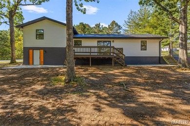 Completely renovated from top to bottom, this 4-bedroom, 3-bath on Terre Du Lac Golf and Country Club in Missouri - for sale on GolfHomes.com, golf home, golf lot