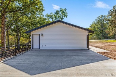 Completely renovated from top to bottom, this 4-bedroom, 3-bath on Terre Du Lac Golf and Country Club in Missouri - for sale on GolfHomes.com, golf home, golf lot