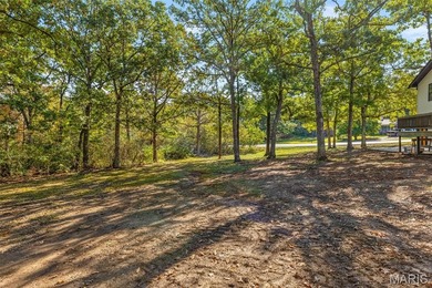 Completely renovated from top to bottom, this 4-bedroom, 3-bath on Terre Du Lac Golf and Country Club in Missouri - for sale on GolfHomes.com, golf home, golf lot