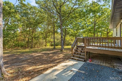 Completely renovated from top to bottom, this 4-bedroom, 3-bath on Terre Du Lac Golf and Country Club in Missouri - for sale on GolfHomes.com, golf home, golf lot