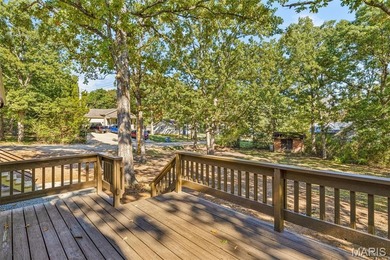 Completely renovated from top to bottom, this 4-bedroom, 3-bath on Terre Du Lac Golf and Country Club in Missouri - for sale on GolfHomes.com, golf home, golf lot