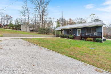 Escape to your dream lake-home retreat! This beautifully on Shady Hollow Golf Course in Kentucky - for sale on GolfHomes.com, golf home, golf lot