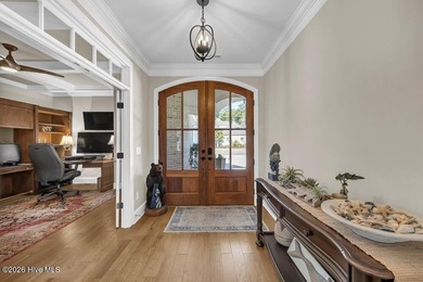 Tucked within the private, gated area of Banyan Bay in Brunswick on Cape Fear National At Brunswick Forest in North Carolina - for sale on GolfHomes.com, golf home, golf lot