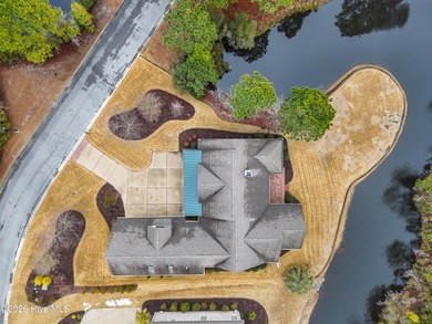 Situated on one of the most beautiful and sought-after streets on Members Club At St. James Plantation in North Carolina - for sale on GolfHomes.com, golf home, golf lot