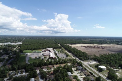 Unleash Your Investment Potential: Multi-Family Development on Oak Hills Country Club in Florida - for sale on GolfHomes.com, golf home, golf lot