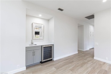 Completely updated Saint Andrews end unit can be yours. Nestled on Quail Village Golf Course in Florida - for sale on GolfHomes.com, golf home, golf lot