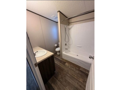 Well-maintained 2-bedroom, 2-bath home situated on a 50' x 150' on Links At Lands End in Texas - for sale on GolfHomes.com, golf home, golf lot