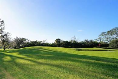 Across the street from GOLF COURSE and Playground ,this charming on Mangrove Bay Golf Course in Florida - for sale on GolfHomes.com, golf home, golf lot