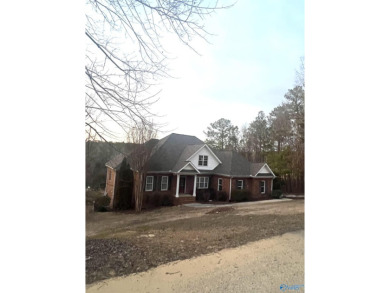 This brick home is located on a cul-de-sac in the gated, golf on Cherokee Ridge Country Club in Alabama - for sale on GolfHomes.com, golf home, golf lot