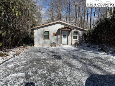 This charming two-bedroom, one-and-a-half-bath cottage features on Land Harbor Golf Course in North Carolina - for sale on GolfHomes.com, golf home, golf lot