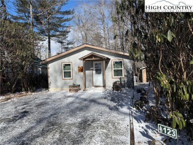 This charming two-bedroom, one-and-a-half-bath cottage features on Land Harbor Golf Course in North Carolina - for sale on GolfHomes.com, golf home, golf lot