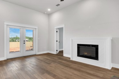Welcome to this beautifully designed 3-bedroom, 2-bath home on Wood Hollow Golf  Course in Texas - for sale on GolfHomes.com, golf home, golf lot