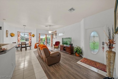 Beautiful 3 bedroom/2bath/2car garage. Wide open lot outside on Lehigh Resort Club in Florida - for sale on GolfHomes.com, golf home, golf lot