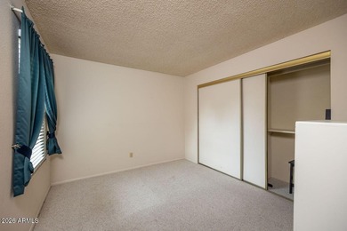 Located in the gated 55+ community of Fountain of the Sun, this on Fountain of the Sun Country Club in Arizona - for sale on GolfHomes.com, golf home, golf lot