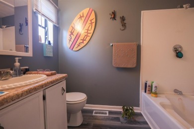 Discover coastal living at its finest in this charming 3-bedroom on Eagle Nest Golf Club in South Carolina - for sale on GolfHomes.com, golf home, golf lot