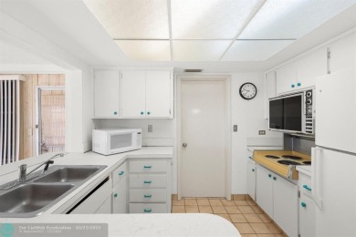 Beautiful 2 bed, 1 bath, garage corner lot with pleasant, quaint on Woodlands Country Club in Florida - for sale on GolfHomes.com, golf home, golf lot
