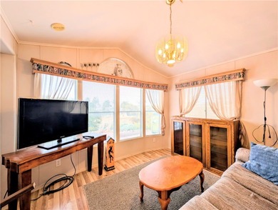 Privacy at its finest. Enclosed patio area in the front of the on Riverview Golf Course in Arizona - for sale on GolfHomes.com, golf home, golf lot