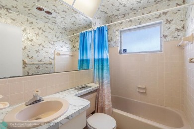 Beautiful 2 bed, 1 bath, garage corner lot with pleasant, quaint on Woodlands Country Club in Florida - for sale on GolfHomes.com, golf home, golf lot