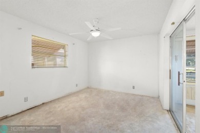 Beautiful 2 bed, 1 bath, garage corner lot with pleasant, quaint on Woodlands Country Club in Florida - for sale on GolfHomes.com, golf home, golf lot