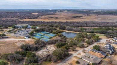 Discover the perfect opportunity to build in the highly on Pecan Plantation Country Club in Texas - for sale on GolfHomes.com, golf home, golf lot