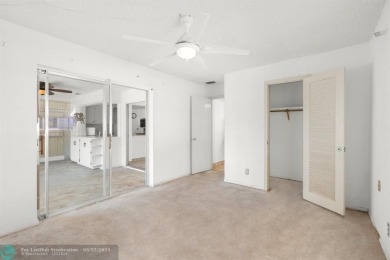 Beautiful 2 bed, 1 bath, garage corner lot with pleasant, quaint on Woodlands Country Club in Florida - for sale on GolfHomes.com, golf home, golf lot