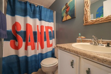 Discover coastal living at its finest in this charming 3-bedroom on Eagle Nest Golf Club in South Carolina - for sale on GolfHomes.com, golf home, golf lot