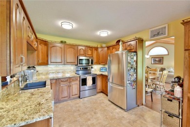 This well-appointed single-level rambler, built in 1989 and on Valley Golf Course in Minnesota - for sale on GolfHomes.com, golf home, golf lot
