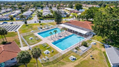 Beautiful 2 bed, 1 bath, garage corner lot with pleasant, quaint on Woodlands Country Club in Florida - for sale on GolfHomes.com, golf home, golf lot