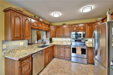 This well-appointed single-level rambler, built in 1989 and on Valley Golf Course in Minnesota - for sale on GolfHomes.com, golf home, golf lot