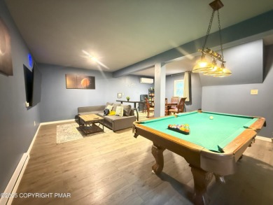 Nestled on a wooded lot backing up to the golf course, this on Pocono Farms Country Club in Pennsylvania - for sale on GolfHomes.com, golf home, golf lot