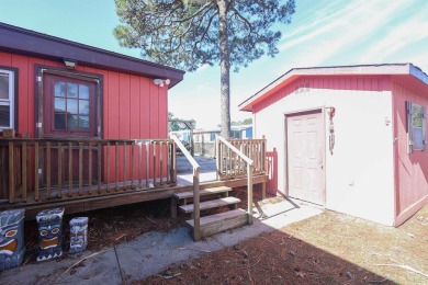 Discover coastal living at its finest in this charming 3-bedroom on Eagle Nest Golf Club in South Carolina - for sale on GolfHomes.com, golf home, golf lot
