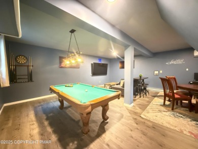 Nestled on a wooded lot backing up to the golf course, this on Pocono Farms Country Club in Pennsylvania - for sale on GolfHomes.com, golf home, golf lot