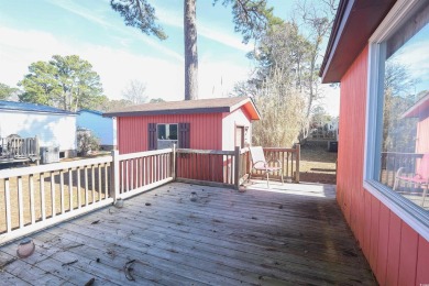 Discover coastal living at its finest in this charming 3-bedroom on Eagle Nest Golf Club in South Carolina - for sale on GolfHomes.com, golf home, golf lot