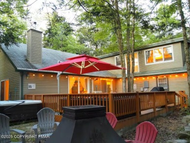 Nestled on a wooded lot backing up to the golf course, this on Pocono Farms Country Club in Pennsylvania - for sale on GolfHomes.com, golf home, golf lot