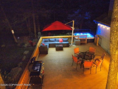 Nestled on a wooded lot backing up to the golf course, this on Pocono Farms Country Club in Pennsylvania - for sale on GolfHomes.com, golf home, golf lot