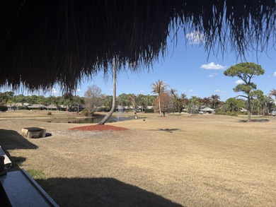 Beautiful landscaped lot that backs to golf course. Waterfall on St. Lucie Trail Golf Club in Florida - for sale on GolfHomes.com, golf home, golf lot