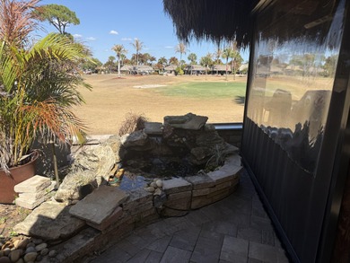 Beautiful landscaped lot that backs to golf course. Waterfall on St. Lucie Trail Golf Club in Florida - for sale on GolfHomes.com, golf home, golf lot