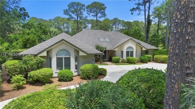 Tucked away on a quiet cul-de-sac street in the Oyster Reef area on Oyster Reef Golf Course in South Carolina - for sale on GolfHomes.com, golf home, golf lot